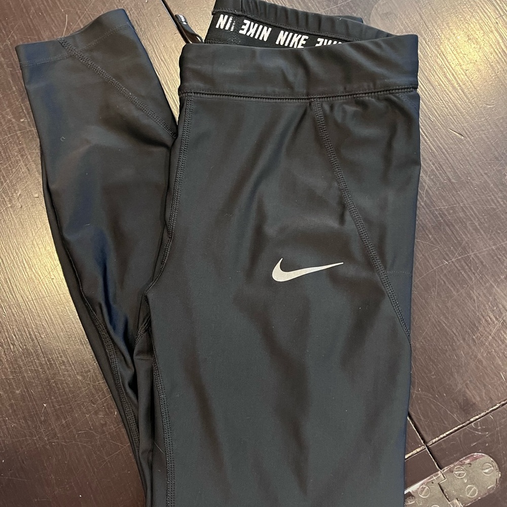 Nike Black dry-fit running pants.